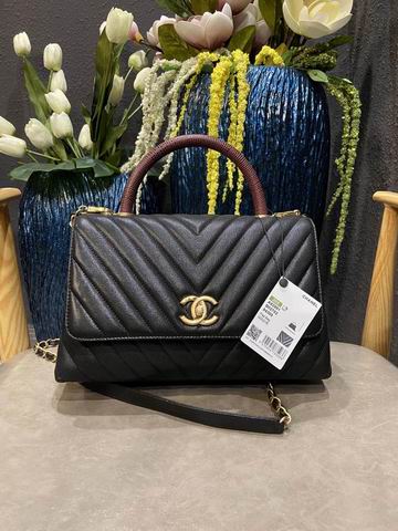 Chanel Coco Handle Flap Bag in Black Chevron Grained Calfskin, Brown Handle