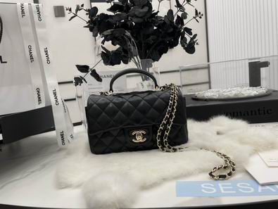Chanel Mini Flap Bag with Top Handle in Black Quilted Leather, Gold Hardware