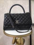 Chanel Coco Handle Medium Top-Handle Flap Bag in Black Quilted Leather