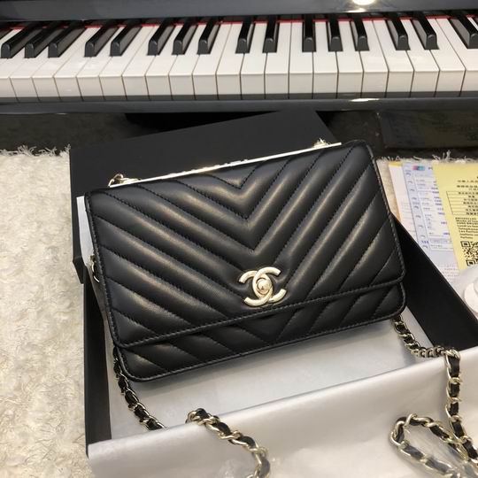 Chanel Wallet on Chain in Black Chevron-Quilted Leather with Gold Chain