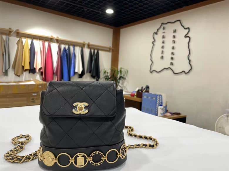 Chanel Quilted Mini Backpack with CC Turnlock and Gold Charm Chain in Black
