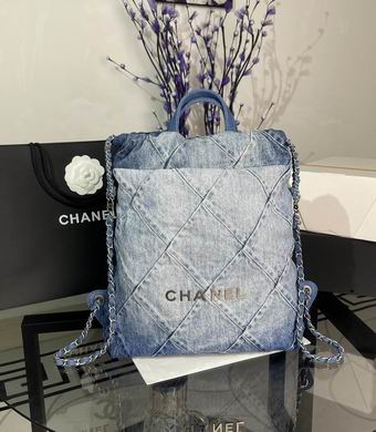 Chanel 22 Backpack in Blue Quilted Denim with Silver-Tone Chain Straps