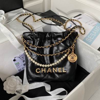 Chanel 22 Mini Drawstring Handbag in Black Shiny Calfskin with Pearl Chain