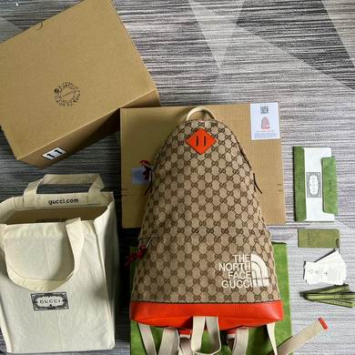 Gucci x The North Face Backpack in GG Canvas with Orange Leather Trim