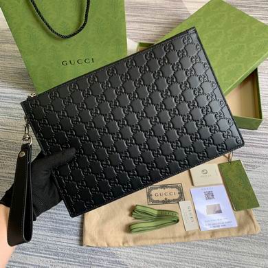 Gucci Signature Zip Pouch Clutch in Black Embossed GG Leather with Wrist Strap