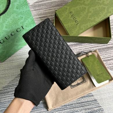 Gucci Microguccissima Long Bi-Fold Wallet in Black Embossed Leather
