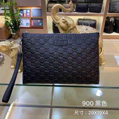 Gucci Guccissima Zip Pouch Clutch with Wrist Strap in Black Embossed Leather