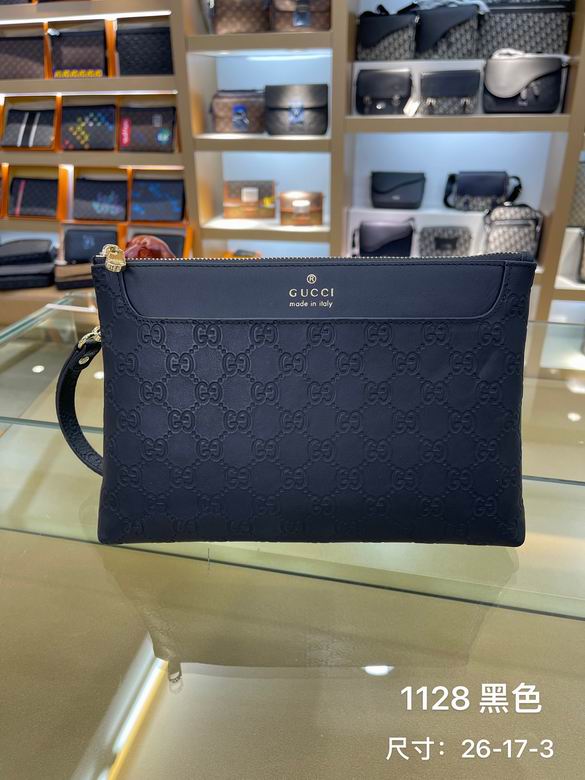 Gucci Zip-Top Wristlet Pouch in Black GG Embossed Leather