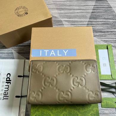 Gucci Jumbo GG Embossed Leather Zip Pouch Clutch in Taupe