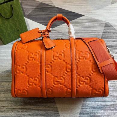 Gucci Jumbo GG Duffle Bag in Orange Embossed Leather with Shoulder Strap