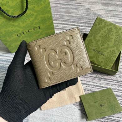 Gucci Jumbo GG Bi-Fold Wallet in Taupe Embossed Leather