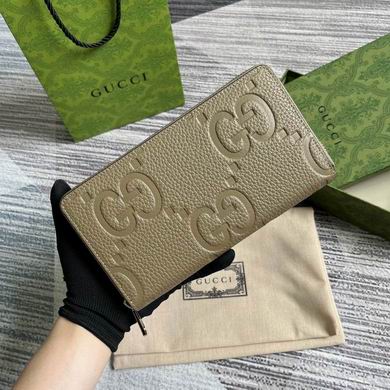 Gucci Jumbo GG Zip-Around Wallet in Taupe Embossed Leather