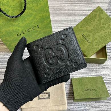 Gucci Jumbo GG Bi-Fold Wallet in Black Embossed Leather
