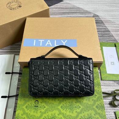 Gucci 395474 GG Embossed Leather Zip-Around Clutch with Top Handle in Black