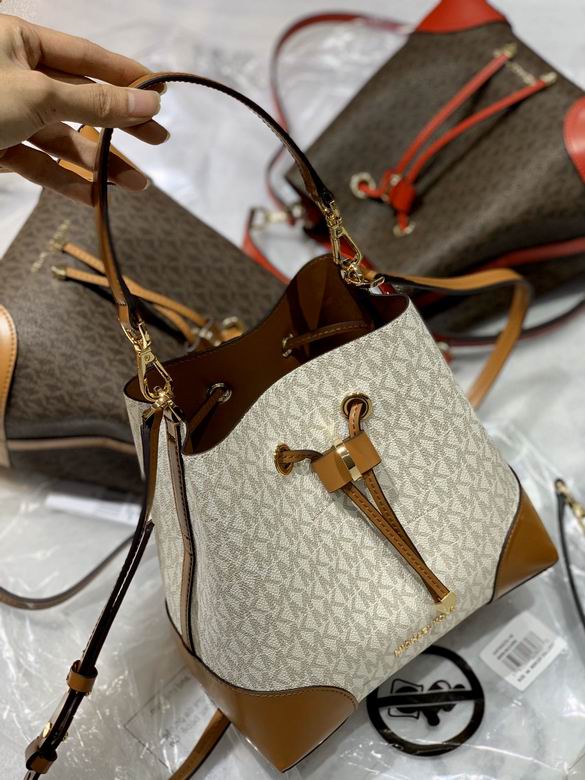 Michael Kors Mercer Medium Bucket Bag in Vanilla Signature Logo with Acorn Trim