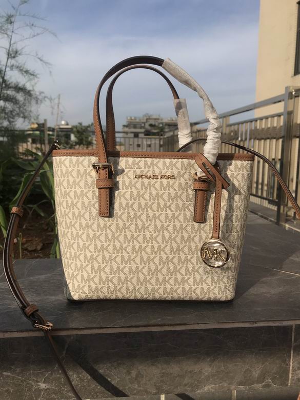Michael Kors Jet Set Travel XS Carryall Tote in Vanilla Signature Logo Canvas