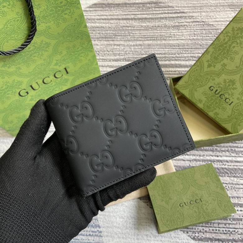 Gucci GG Embossed Bi-Fold Wallet in Black Leather