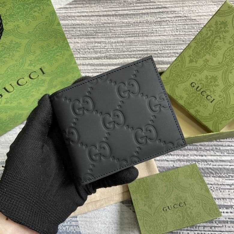 Gucci GG Embossed Bi-Fold Wallet in Black Leather