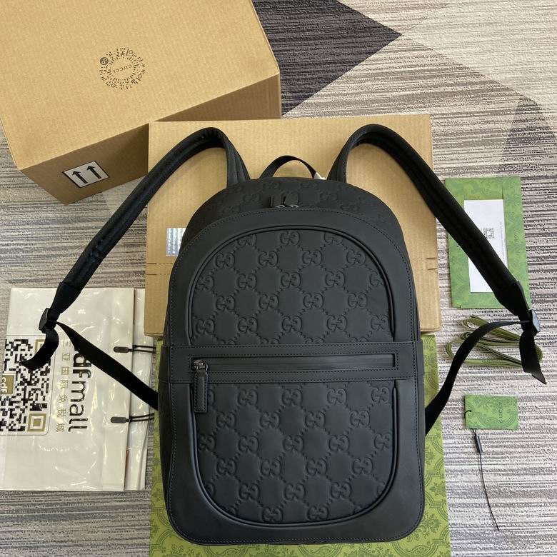 Gucci GG Embossed Backpack with Front Zip Pocket in Black