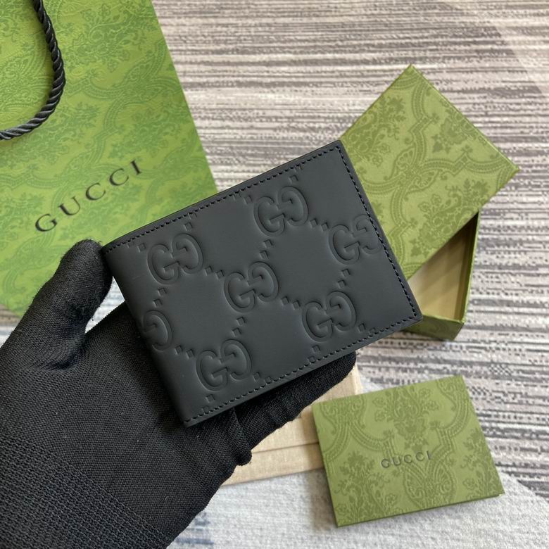 Gucci GG Embossed Bi-Fold Wallet in Black Leather