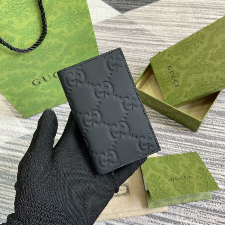 Gucci GG Embossed Bifold Card Case Wallet in Black Leather