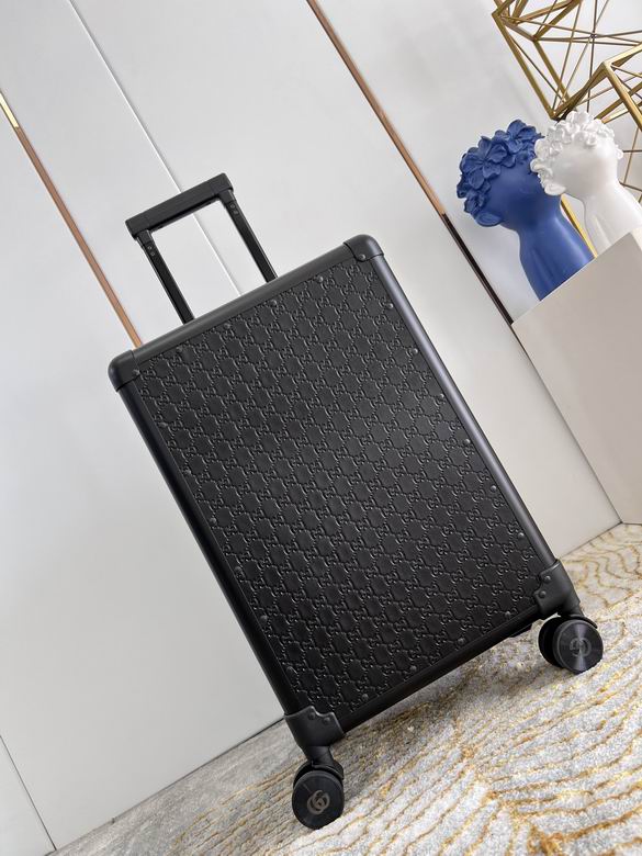 Gucci GG Embossed Leather Cabin Rolling Suitcase in Black