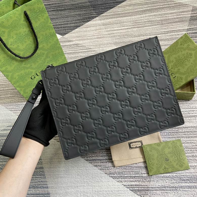 Gucci Signature Zip Pouch with Wrist Strap in Black Embossed GG Leather
