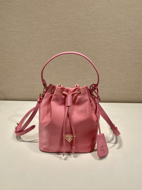 Prada Re-Nylon Mini Bucket Bag with Drawstring and Top Handle in Pink