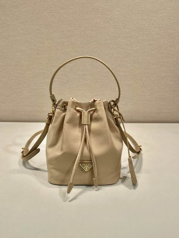 Prada Re-Nylon and Saffiano Leather Mini Bucket Bag in Beige