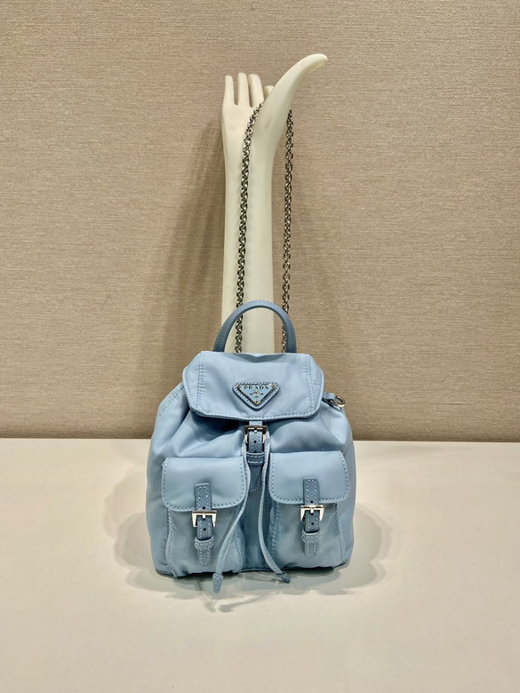 Prada Re-Nylon Mini Backpack with Chain Strap in Light Blue