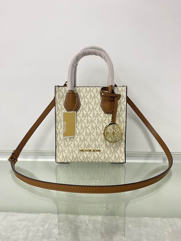 Michael Kors Mercer Extra-Small Logo Crossbody Tote in Vanilla with Tan Trim