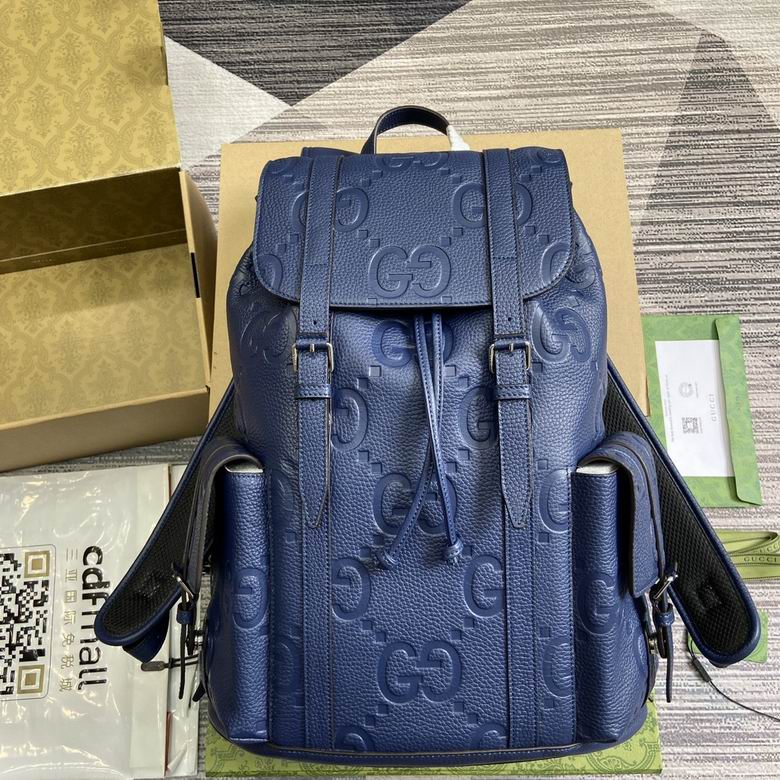 Gucci Jumbo GG Backpack in Navy Blue Embossed Leather with Drawstring Flap