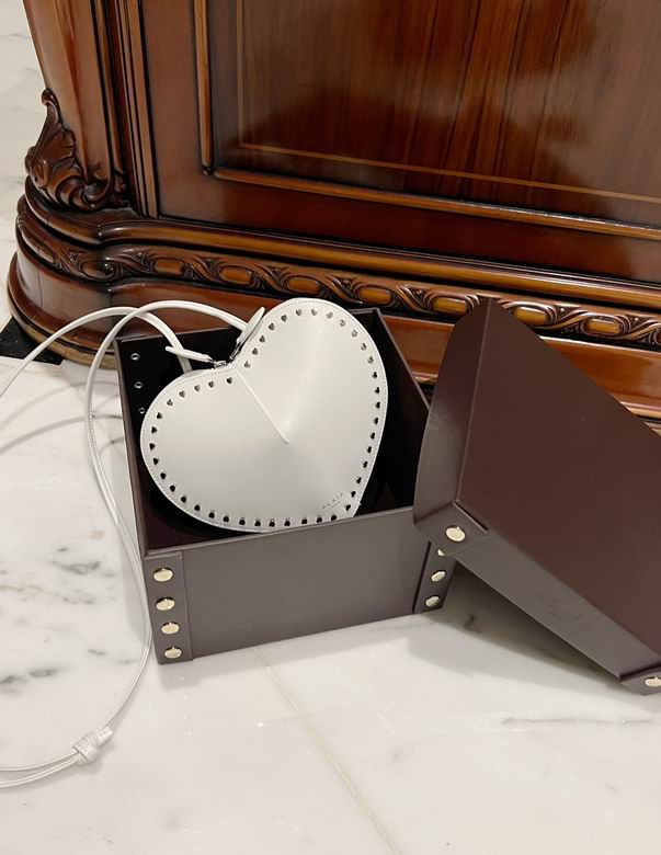 Alaïa Le Cœur Heart-Shaped Crossbody Bag in White Leather with Studs