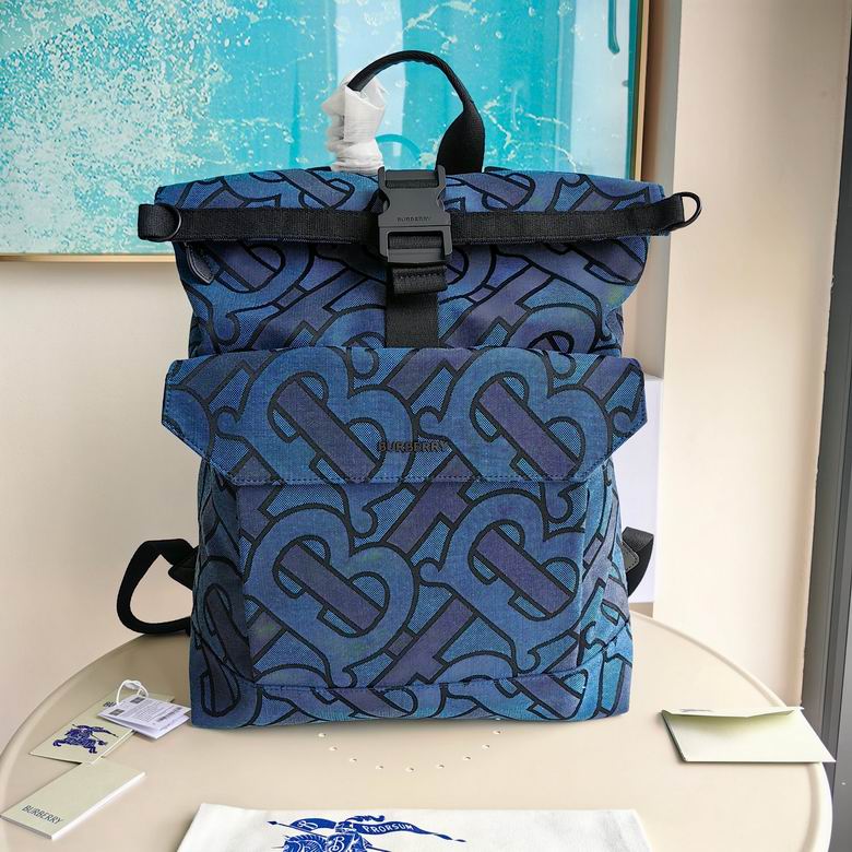 Burberry Monogram Print Roll-Top Backpack in Iridescent Blue