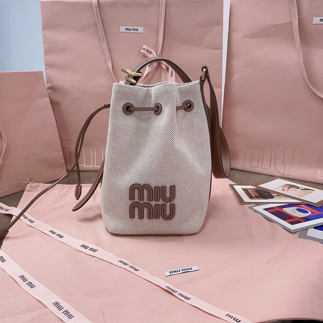 Miu Miu 5BE090 Drawstring Bucket Bag in Natural Canvas with Tan Leather