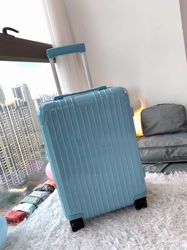 Rimowa Essential Hard-Shell Spinner Suitcase in Glossy Light Blue