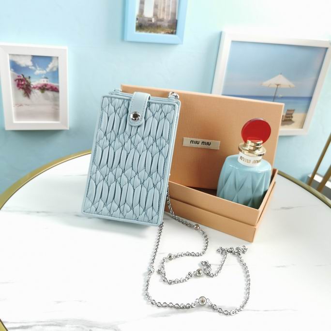 Miu Miu Matelassé Phone Crossbody Bag in Light Blue Leather with Chain Strap