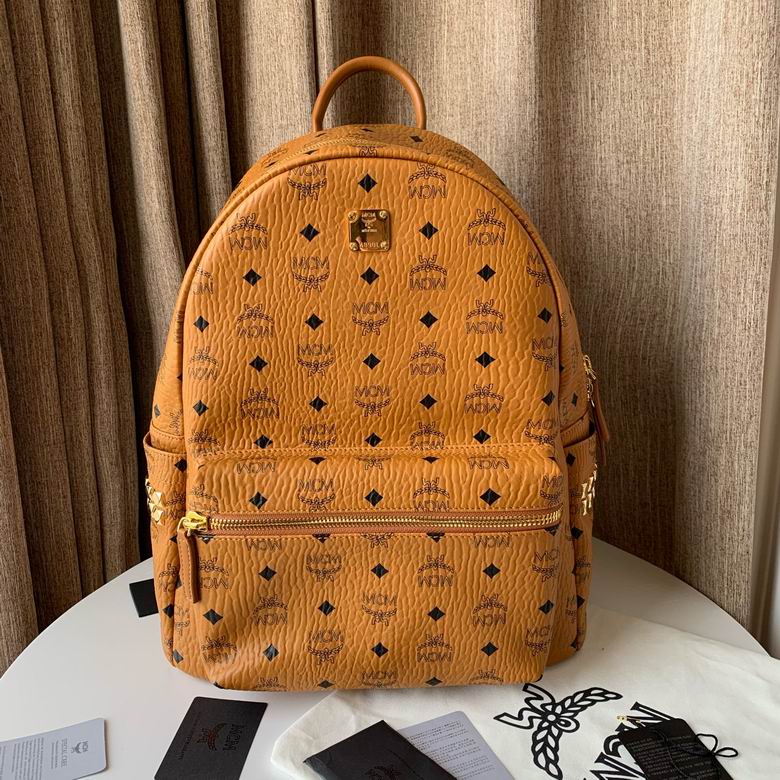 MCM Stark Side Studs Backpack in Cognac Visetos Coated Canvas