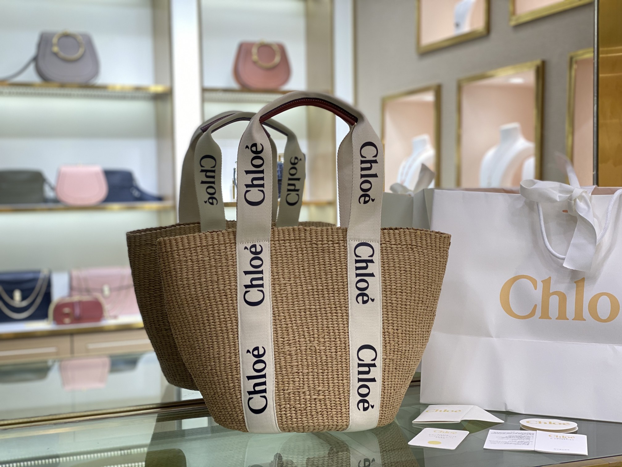 Chloé Woody Basket Tote Bag in Natural Straw with White Logo Ribbon