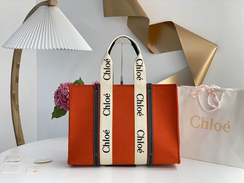 Chloé Woody Small Tote Bag in Orange Canvas with Logo Ribbon Straps